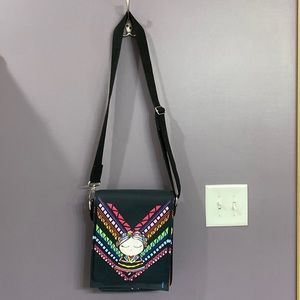 Super cute crossbody tablet/computer bag.